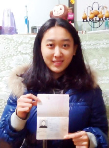 Li Chengjin with her passport and visa ready for Israel
